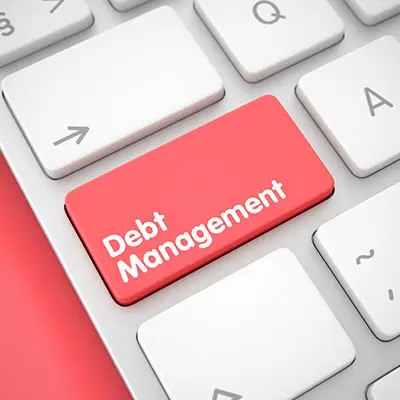 Image of debt management key on keyboard