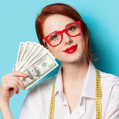 Image of woman holding cash
